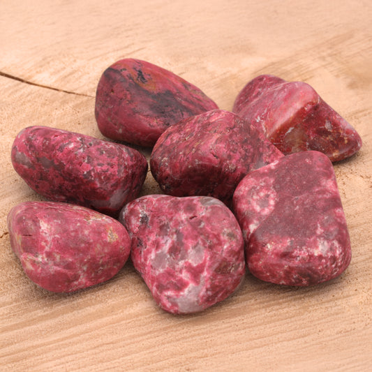 Thulite tumbled stone