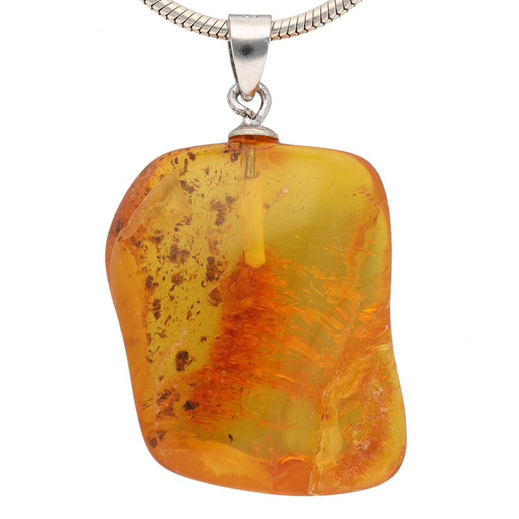 Natural amber pendant | polished | with silver eyelet
