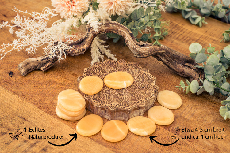 Orange calcite disc stone